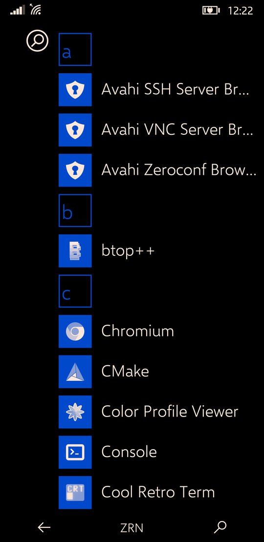 The ztOS app list, alphabetical, with letter tiles
